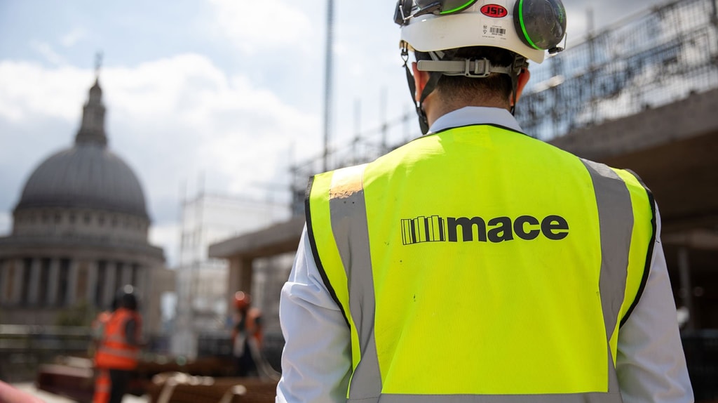 Mace employee on construction site with their Mace PPE and Mace branding visible