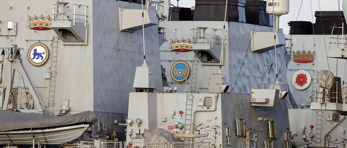 A large ship with a lot of windows on it's side