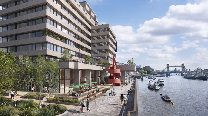 A CGI architectural rendering of a contemporary mixed-use riverside development on the River Thames in daylight. The stepped building features extensive glazing, landscaped terraces and outdoor seating areas at ground level. A pedestrian waterfront promenade runs alongside the river, with people walking and gathering in public spaces. Tower Bridge is visible in the background, with boats moored and travelling along the water under a bright sky with scattered clouds.
