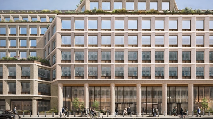 A modern commercial building titled One Victoria Street features a symmetrical facade, large windows, and green terraces in an urban setting.