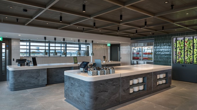 Stylish breakout area at Taylor Wessing with plush seating, soft lighting, and a relaxed atmosphere designed for informal meetings and collaboration