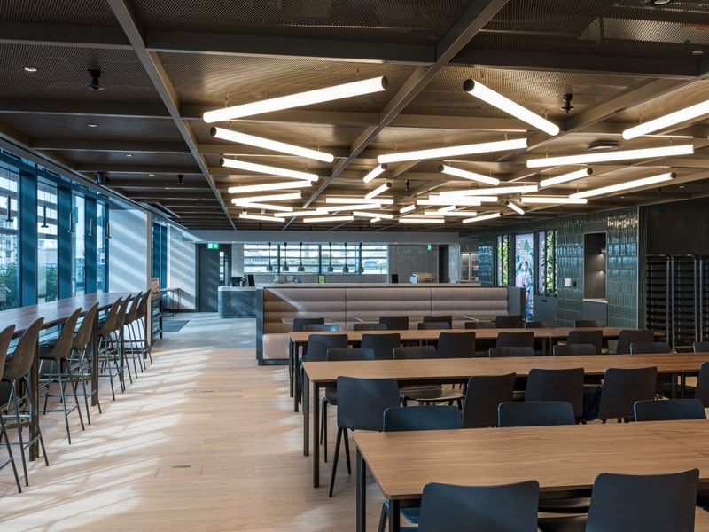 Elegant meeting room at Taylor Wessing with sleek furniture, integrated technology, and a clean, professional ambiance suited for client presentations.